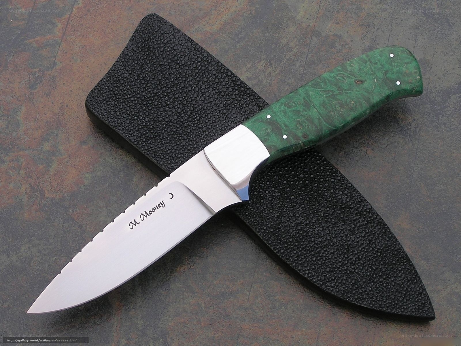 green-handled knife with sheath