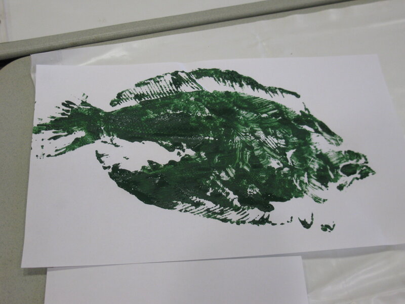 green handprint fish drawing
