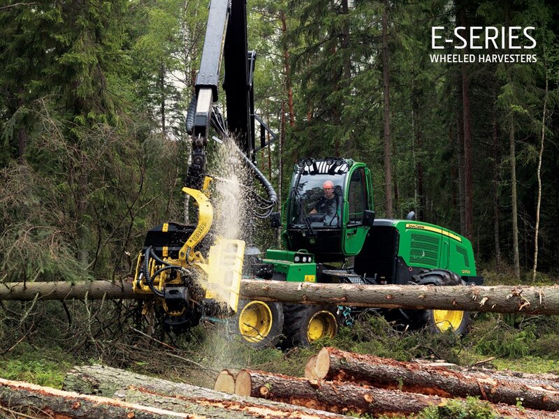 Green harvester in forest