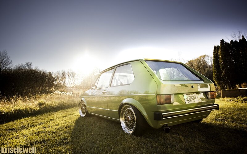 Green Hatchback Car — Dramatic, Sunset