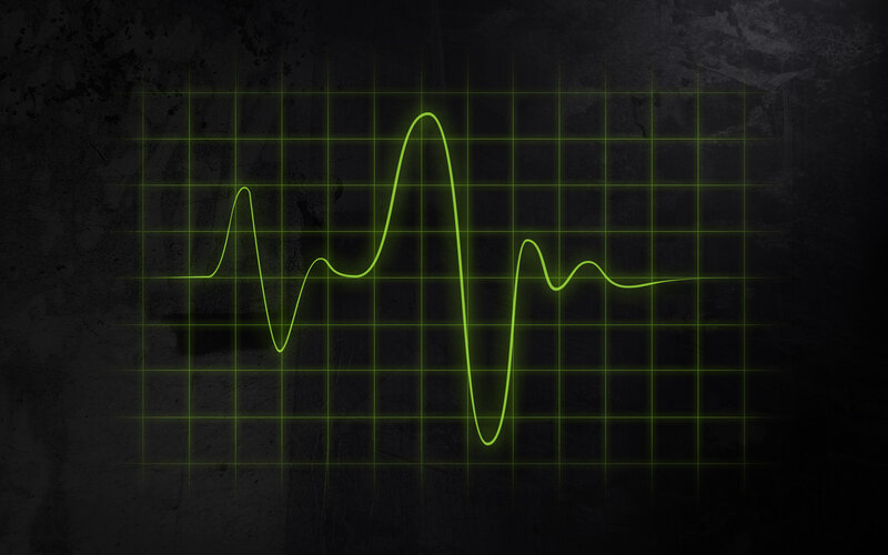 green heartbeat on dark grid