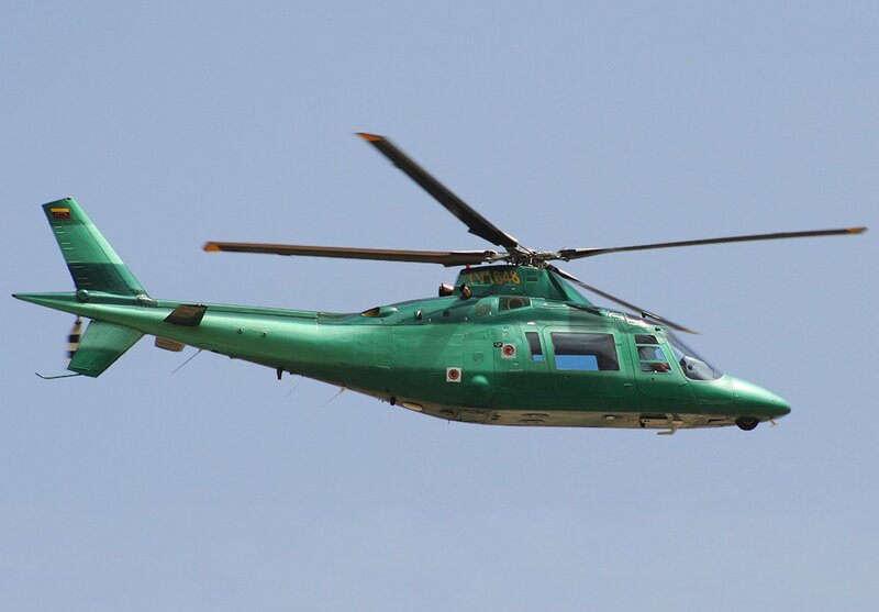 Green Helicopter in Flight — Calm