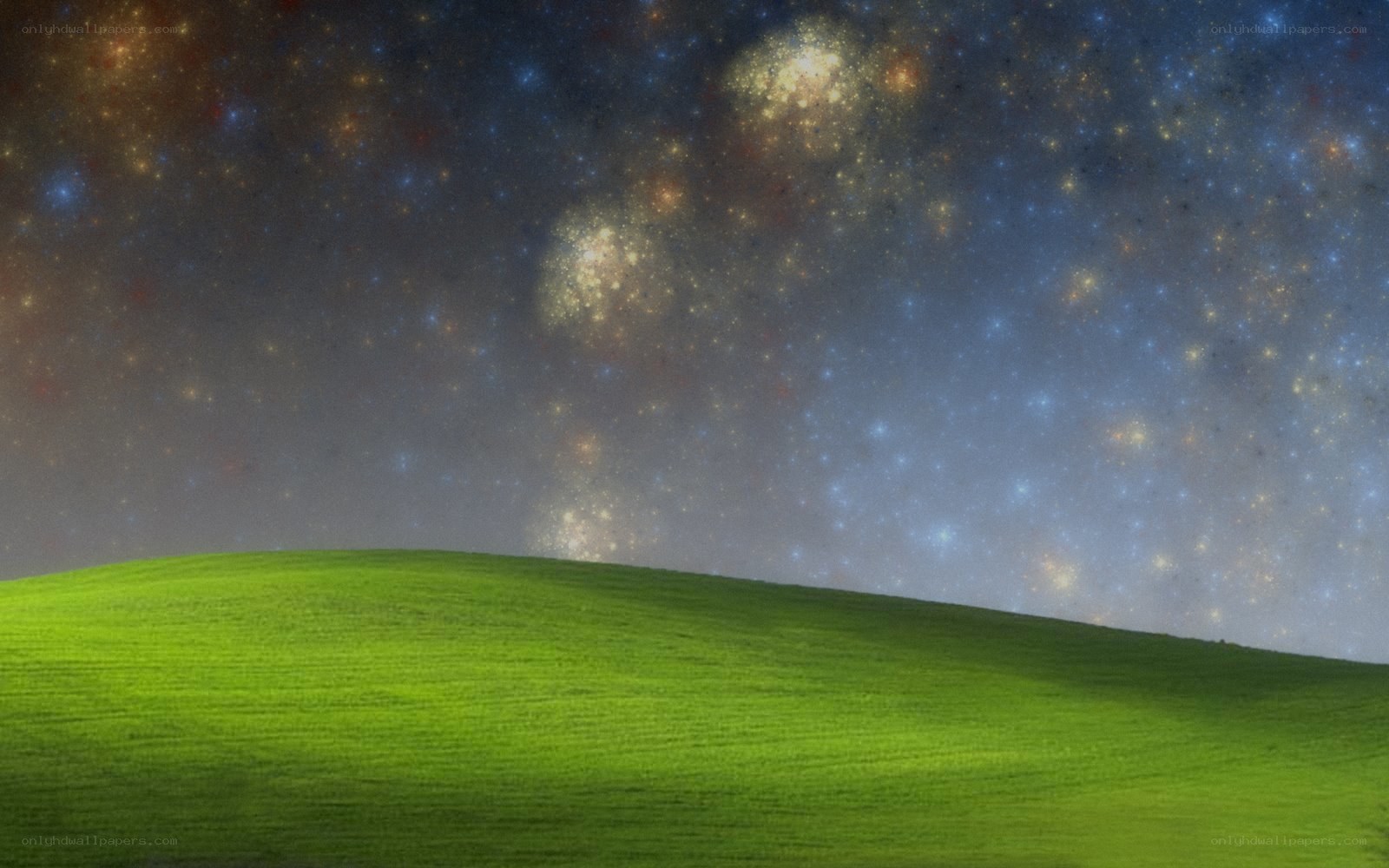 green hill under starry sky