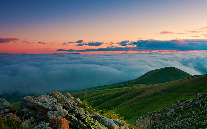 Green Hills Above Clouds