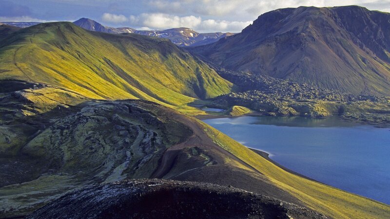 Green hills and blue lake landscape
