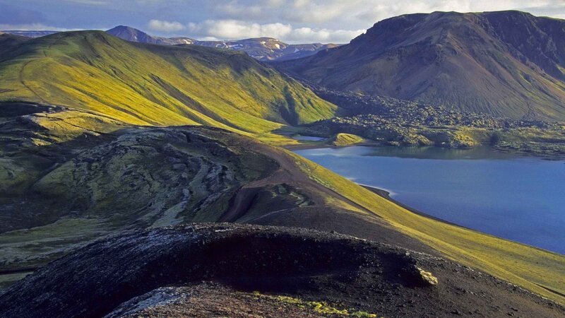 Green hills and blue lake landscape
