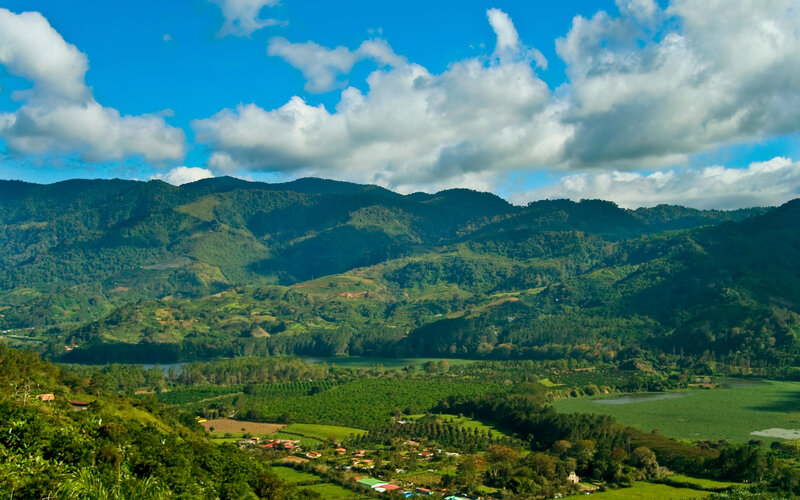 Green hills and blue sky landscape