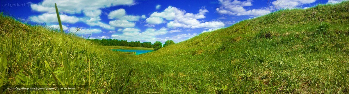 Green hills and blue sky landscape