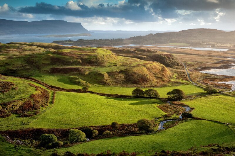 Green hills and coastal landscape