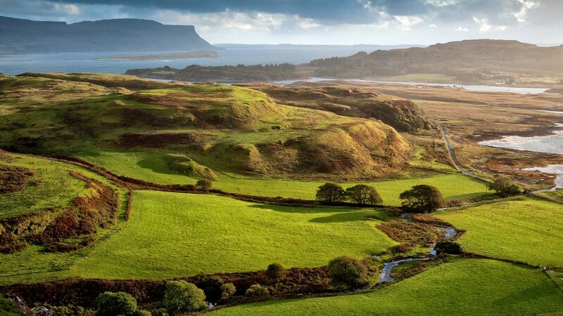Green hills and coastal landscape