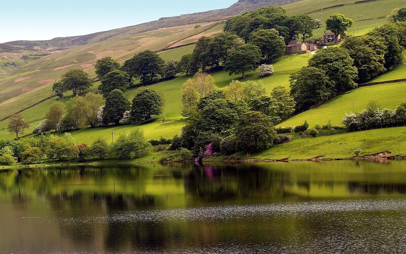 Green hills and lake landscape