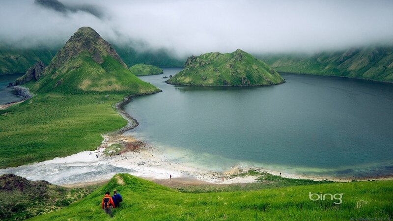 Green hills and lake landscape