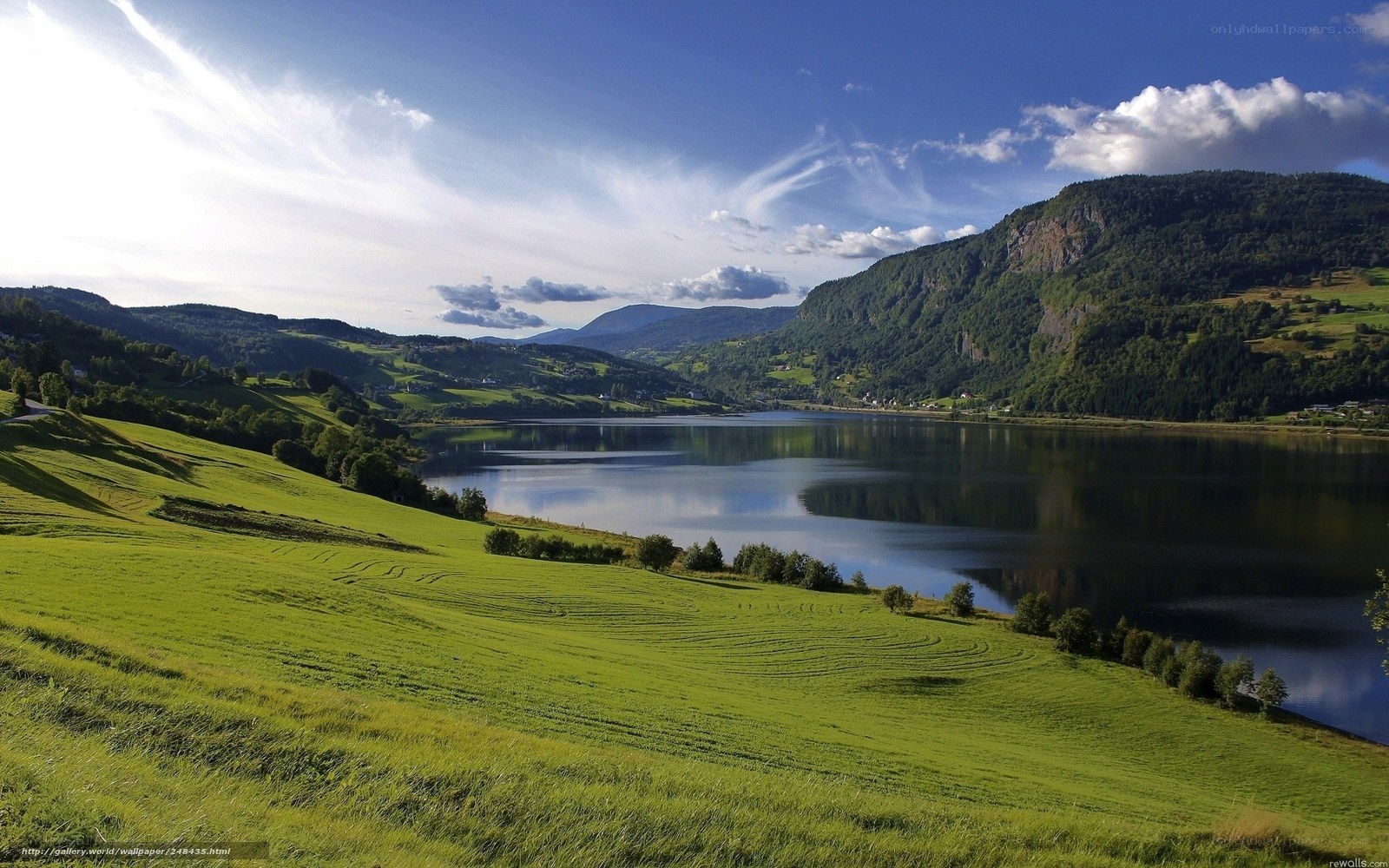 Green hills and lake landscape