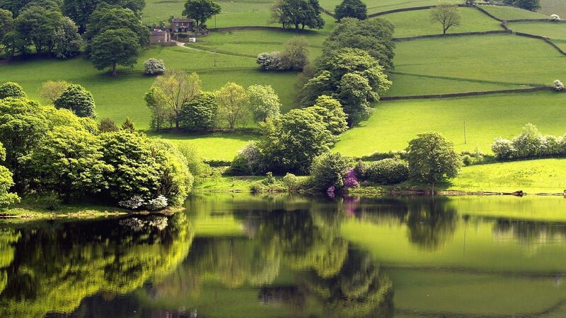 Green hills and lake landscape
