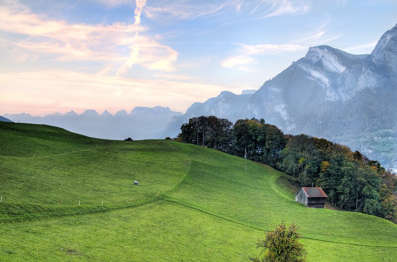 Green hills and mountains at dawn