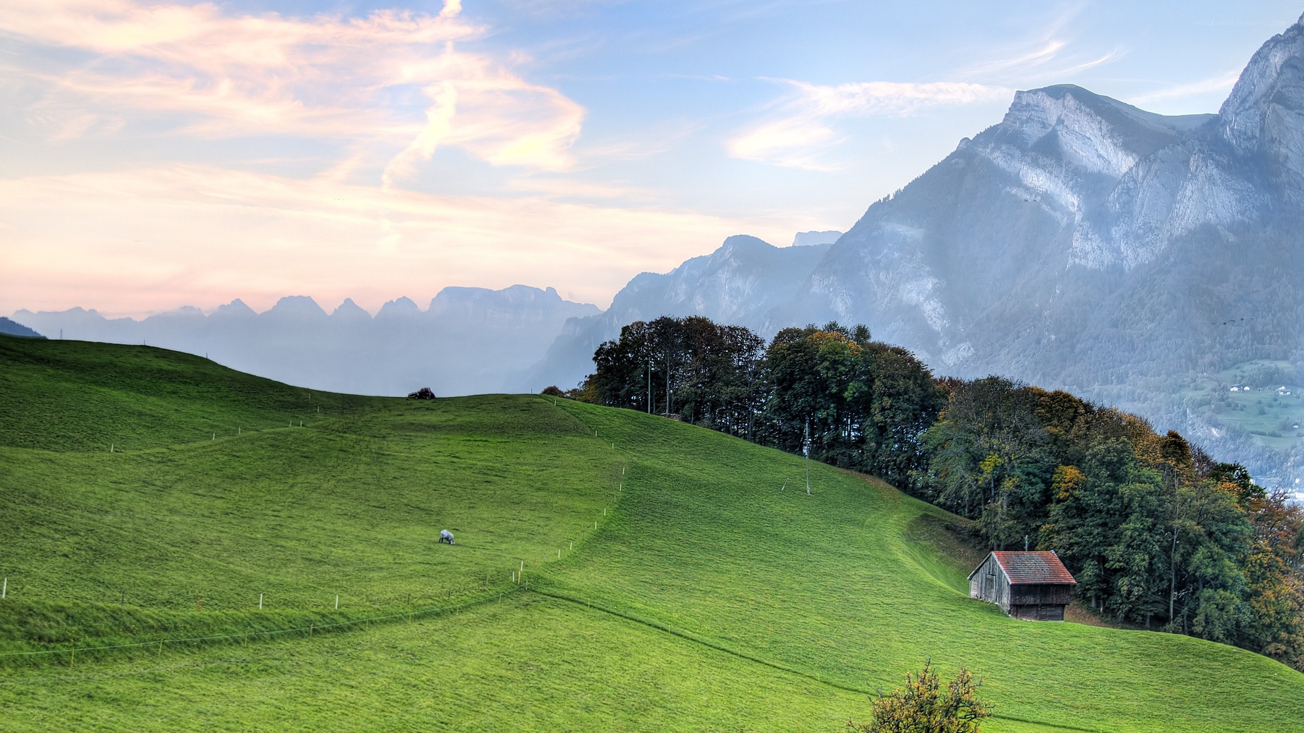 Green hills and mountains at sunset