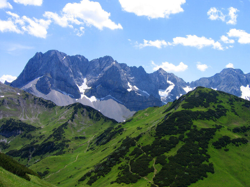 Green hills and rocky mountains