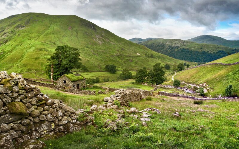 Green hills and stone walls