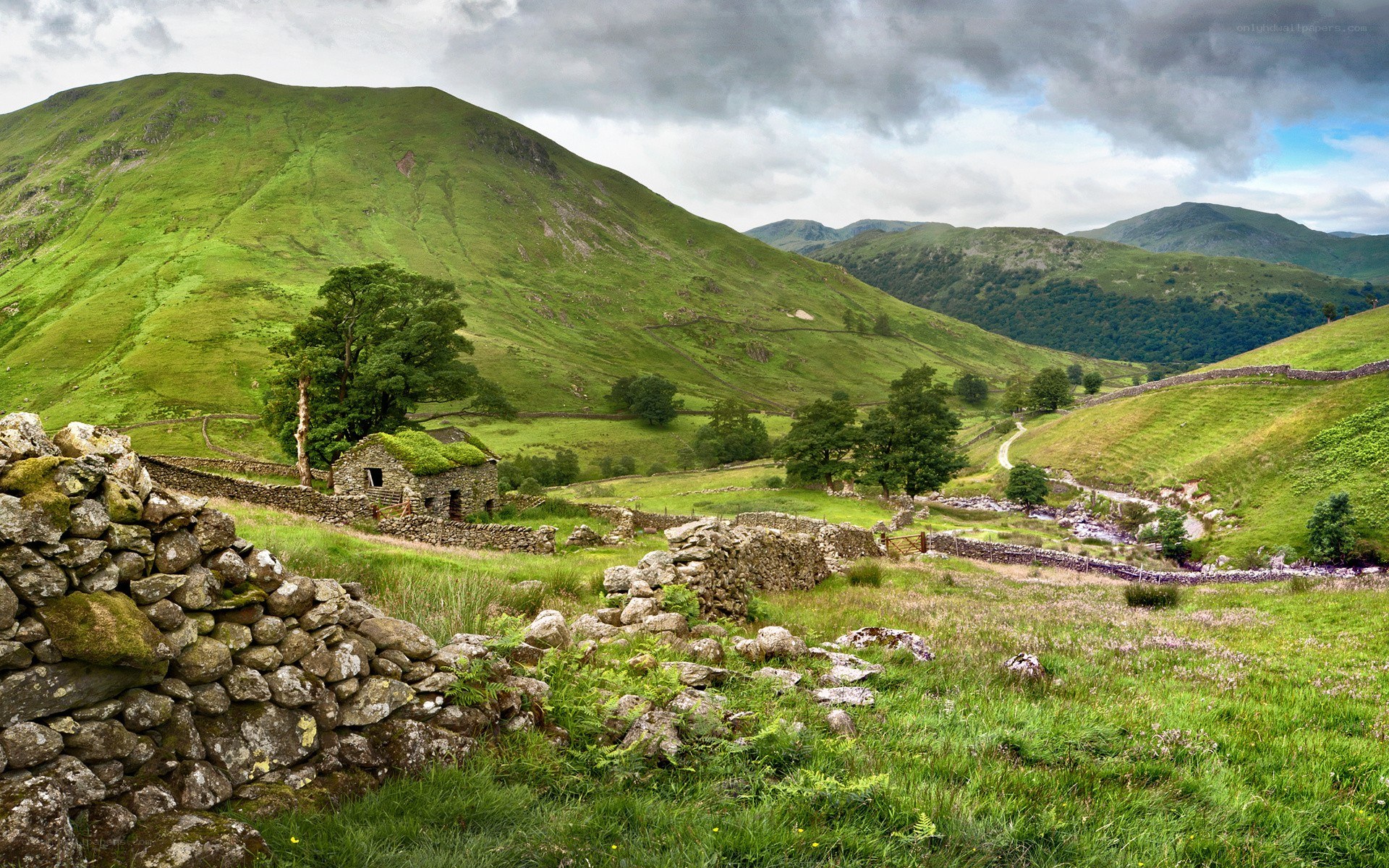 Green hills and stone walls