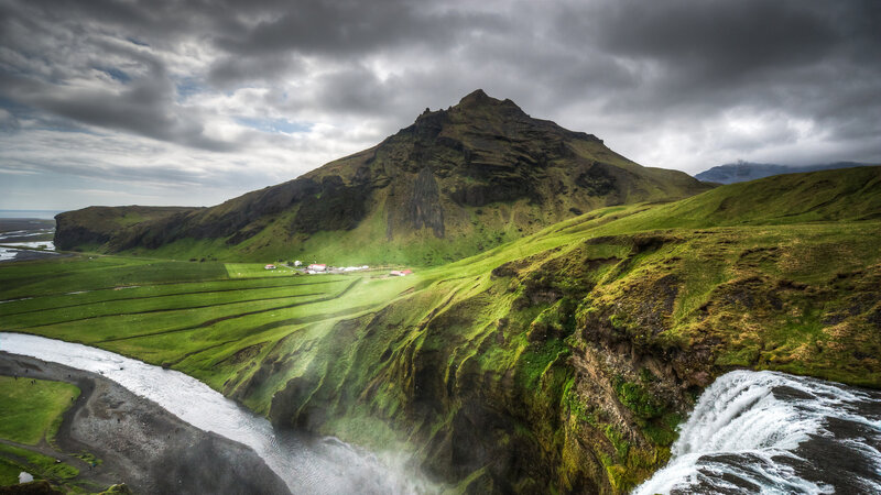 Green Hills and Waterfall — Dramatic