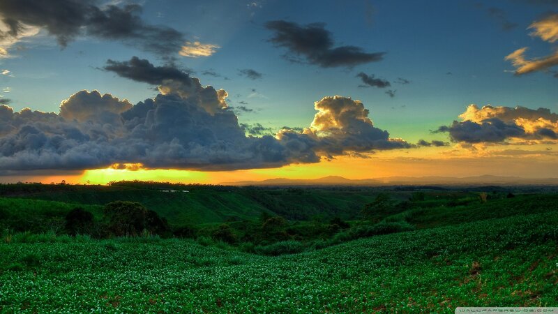 Green Hills at Sunset — Dramatic, Photograph, Clouds