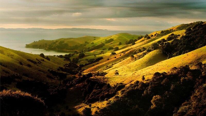 Green Hills by the Sea — Serene, Sunset