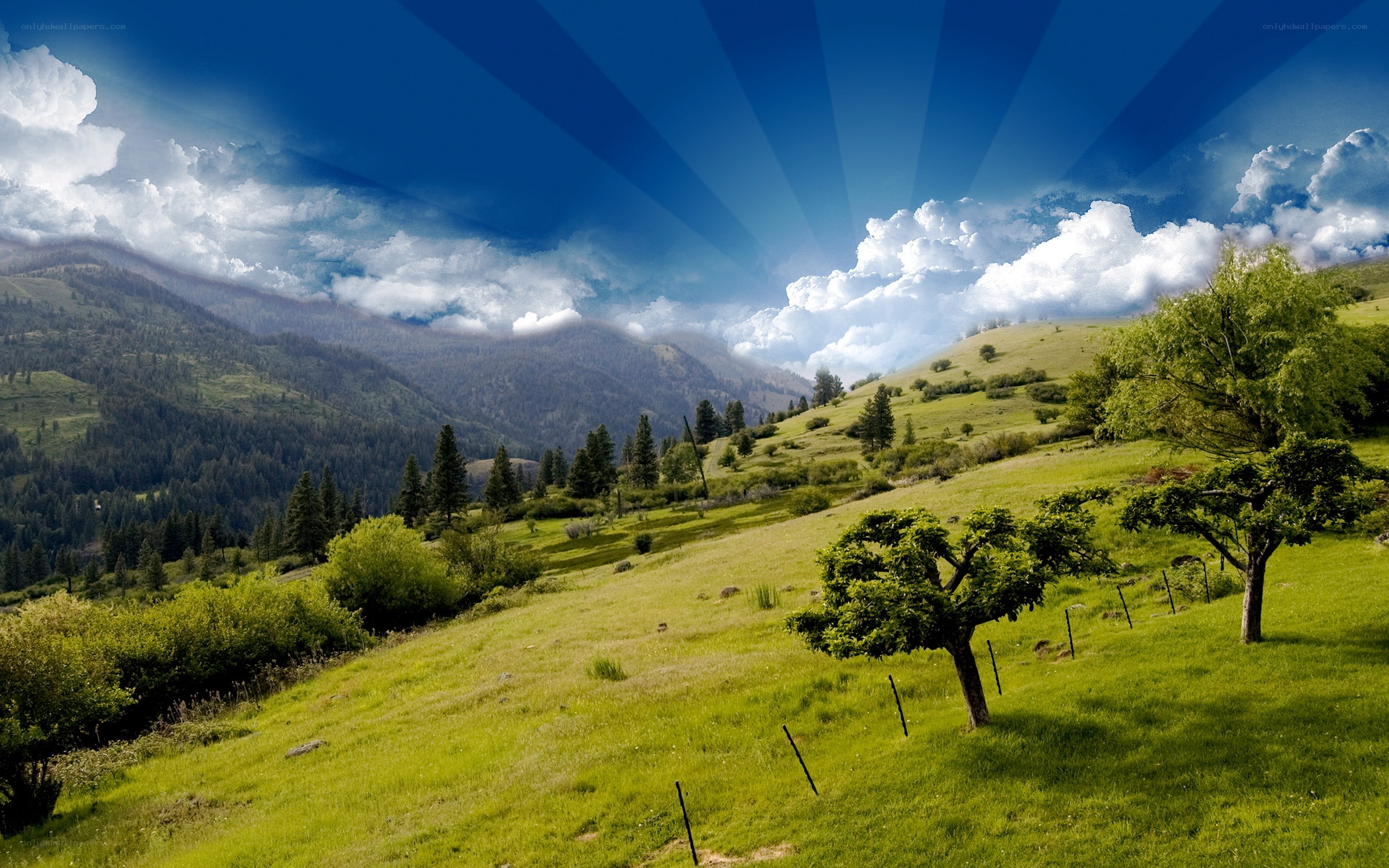 Green hills under blue sky
