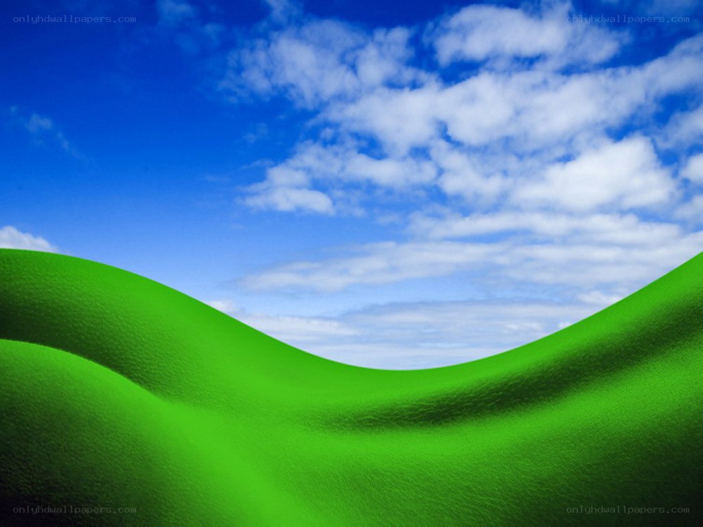 Green hills under blue sky