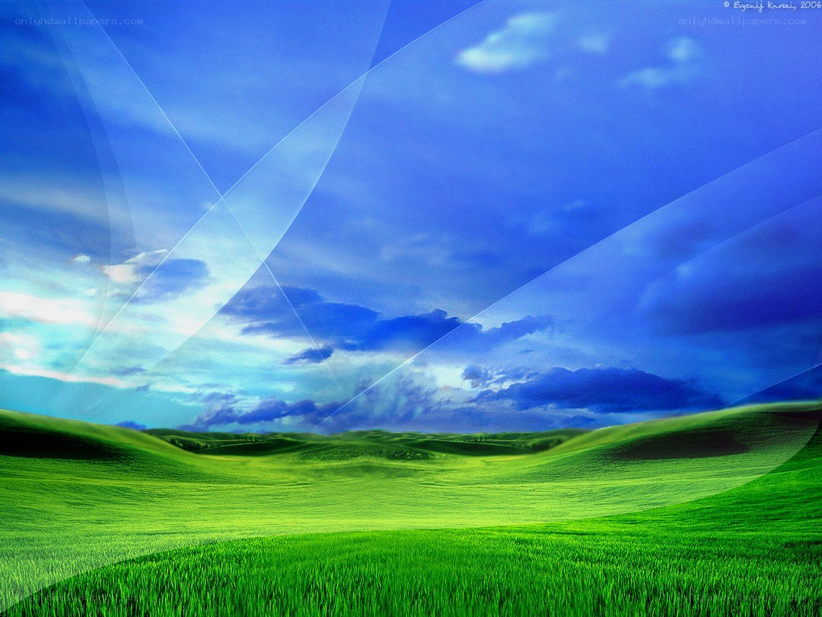 Green hills under blue sky