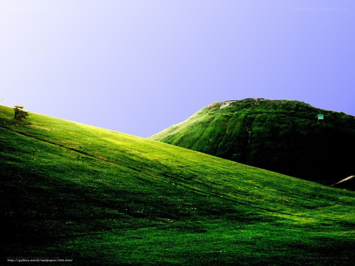 Green Hills Under Blue Sky