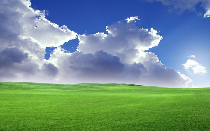 Green Hills under Clouds — Serene, Blue
