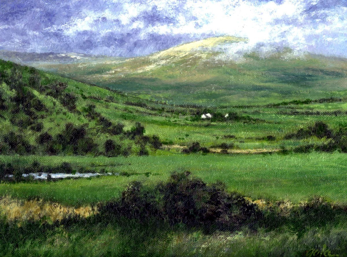 Green hills under cloudy sky