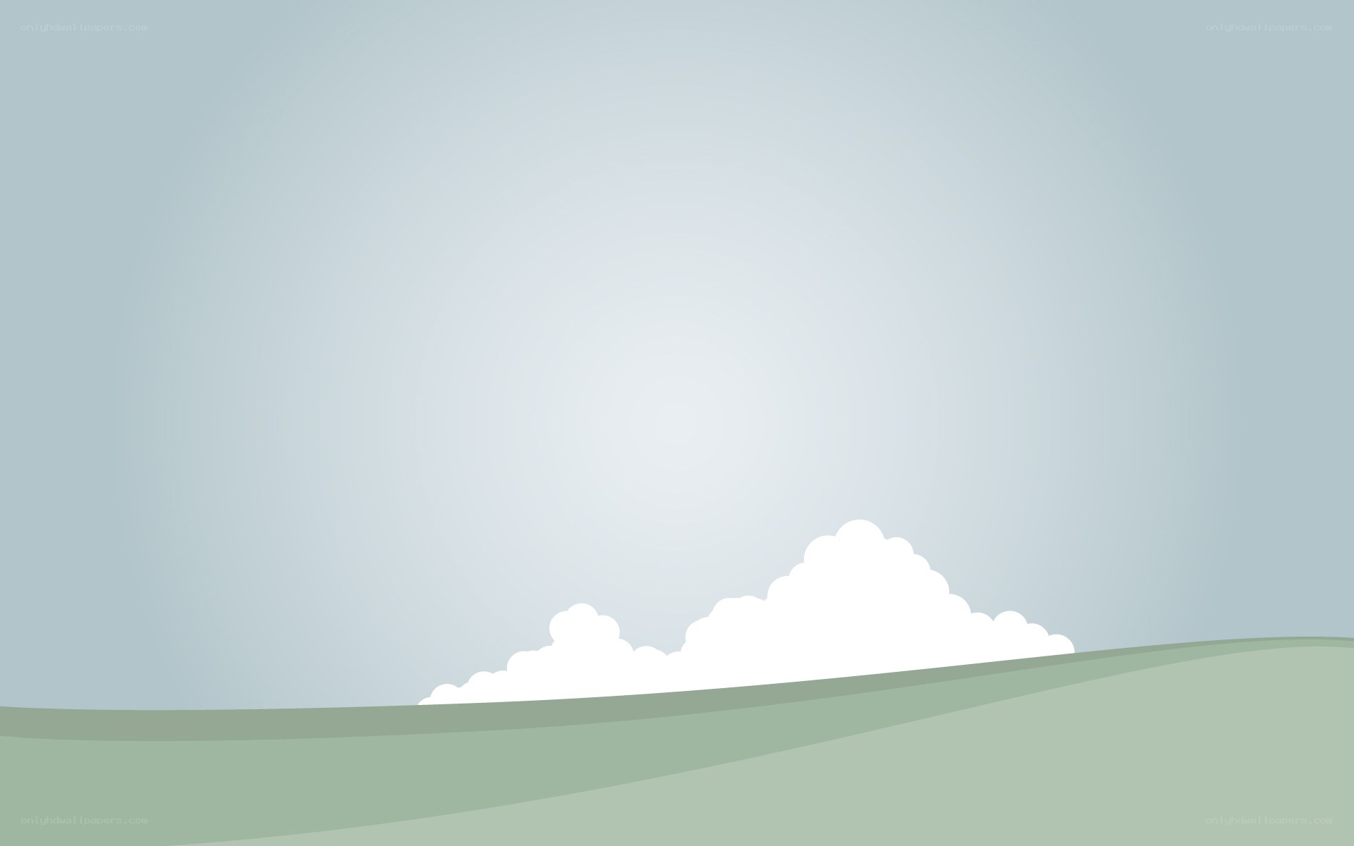 green hills under cloudy sky