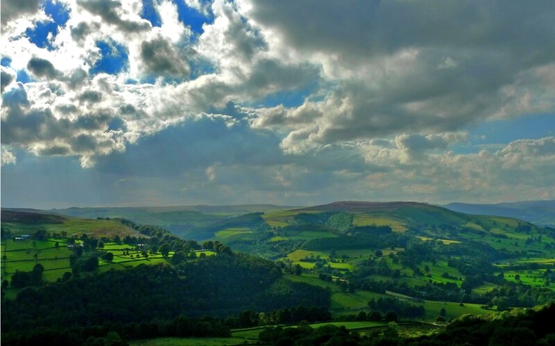 Green Hills under Cloudy Sky — Dramatic, Afternoon