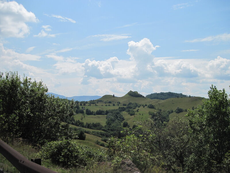 Green Hills under Cloudy Sky — Serene, Afternoon