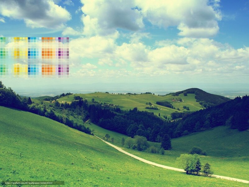 Green hills under cloudy sky