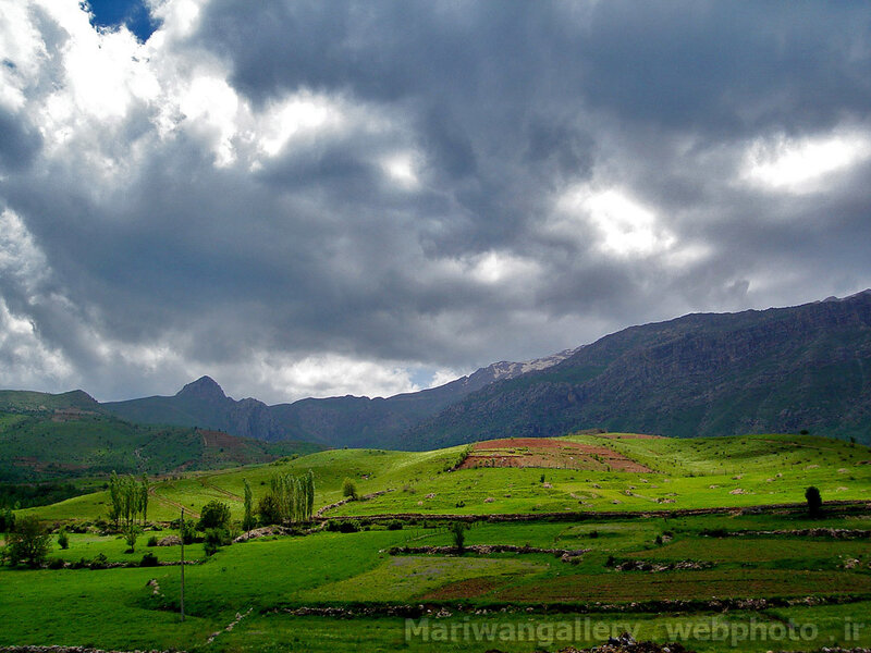 Green Hills under Stormy Sky — Dramatic, Afternoon, Photograph, Mountains, Clouds, Fields