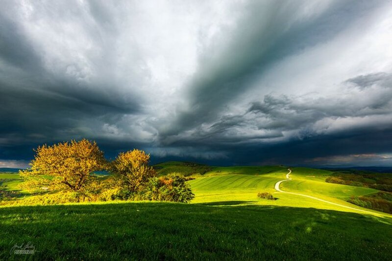 Green Hills under Stormy Sky — Dramatic, Afternoon, Photograph