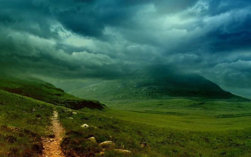 Green Hills under Stormy Sky — Dramatic