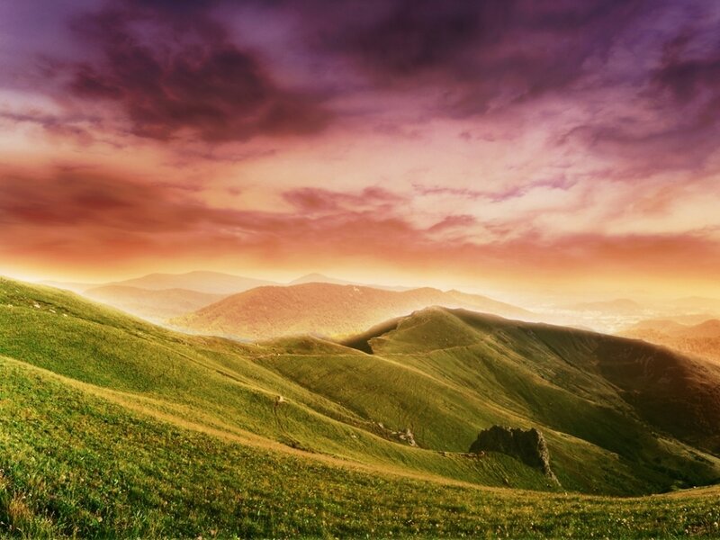 Green Hills under Sunset Sky