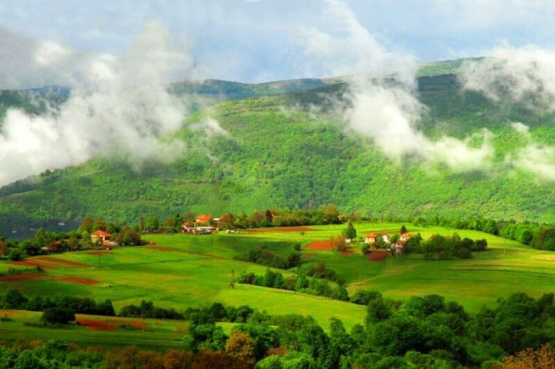 Green hills with clouds