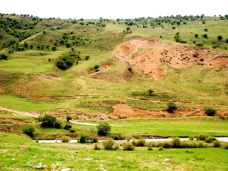 Green hills with erosion