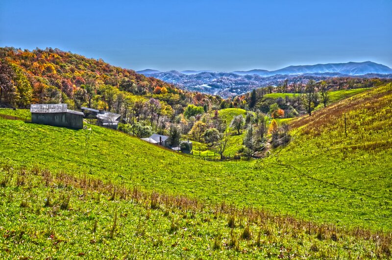 Green Hills with Farm Buildings — Serene