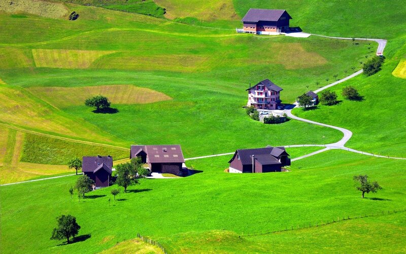 Green hills with farmhouses