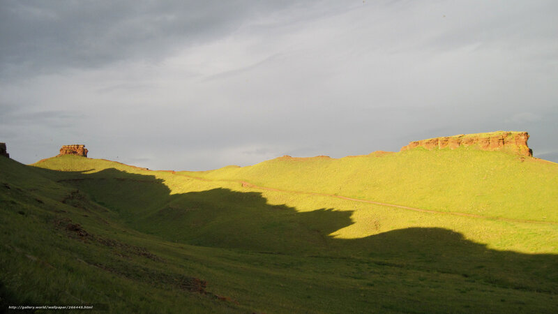 Green Hills with Rock Formations — Dramatic