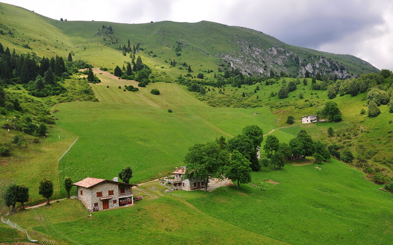 Green hills with stone houses