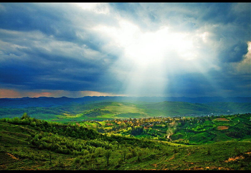 Green Hills with Sunbeams