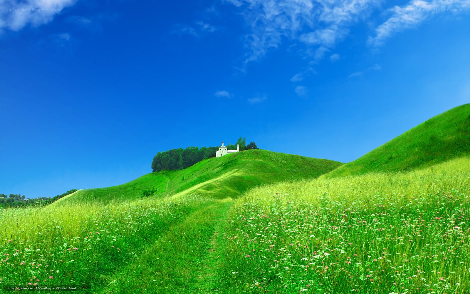 Green hills with white church