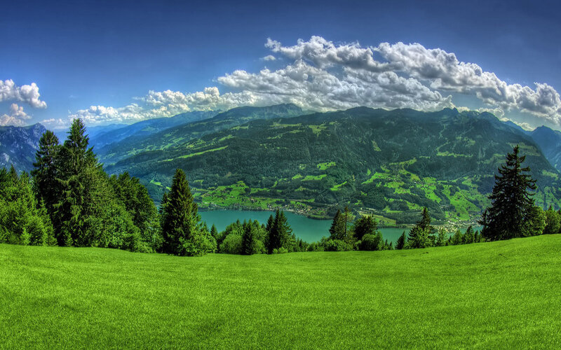 Green Hillside with Lake — Serene