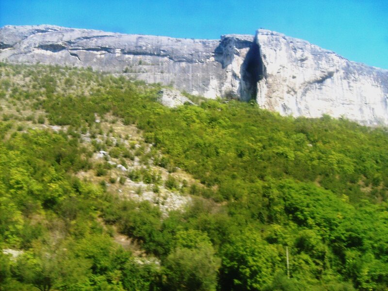 Green Hillside with Rock Formation